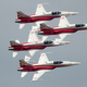 Illustration for article titled Watch seven jets landing in perfect formation